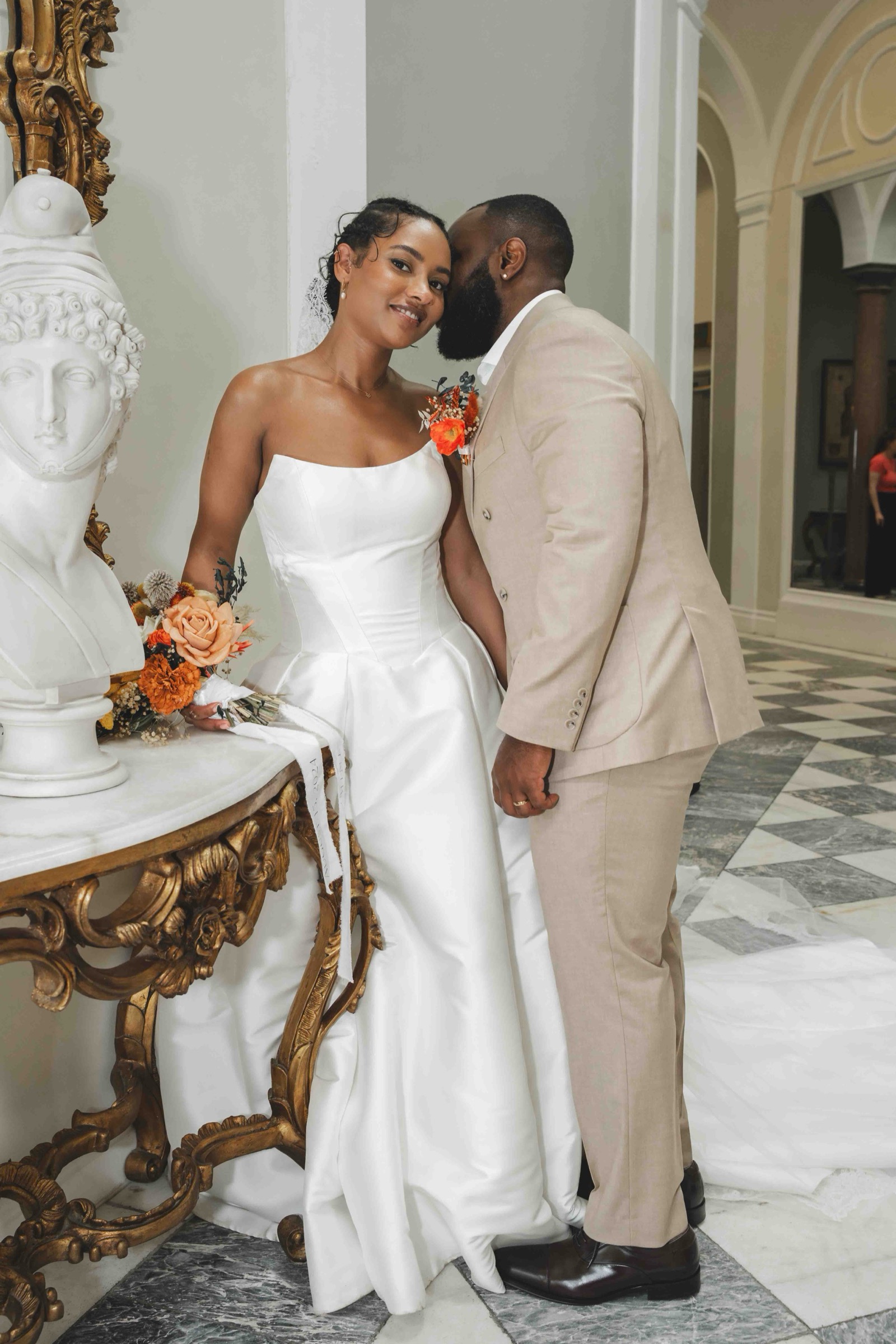 Drinks reception candid — guests laughing and celebrating