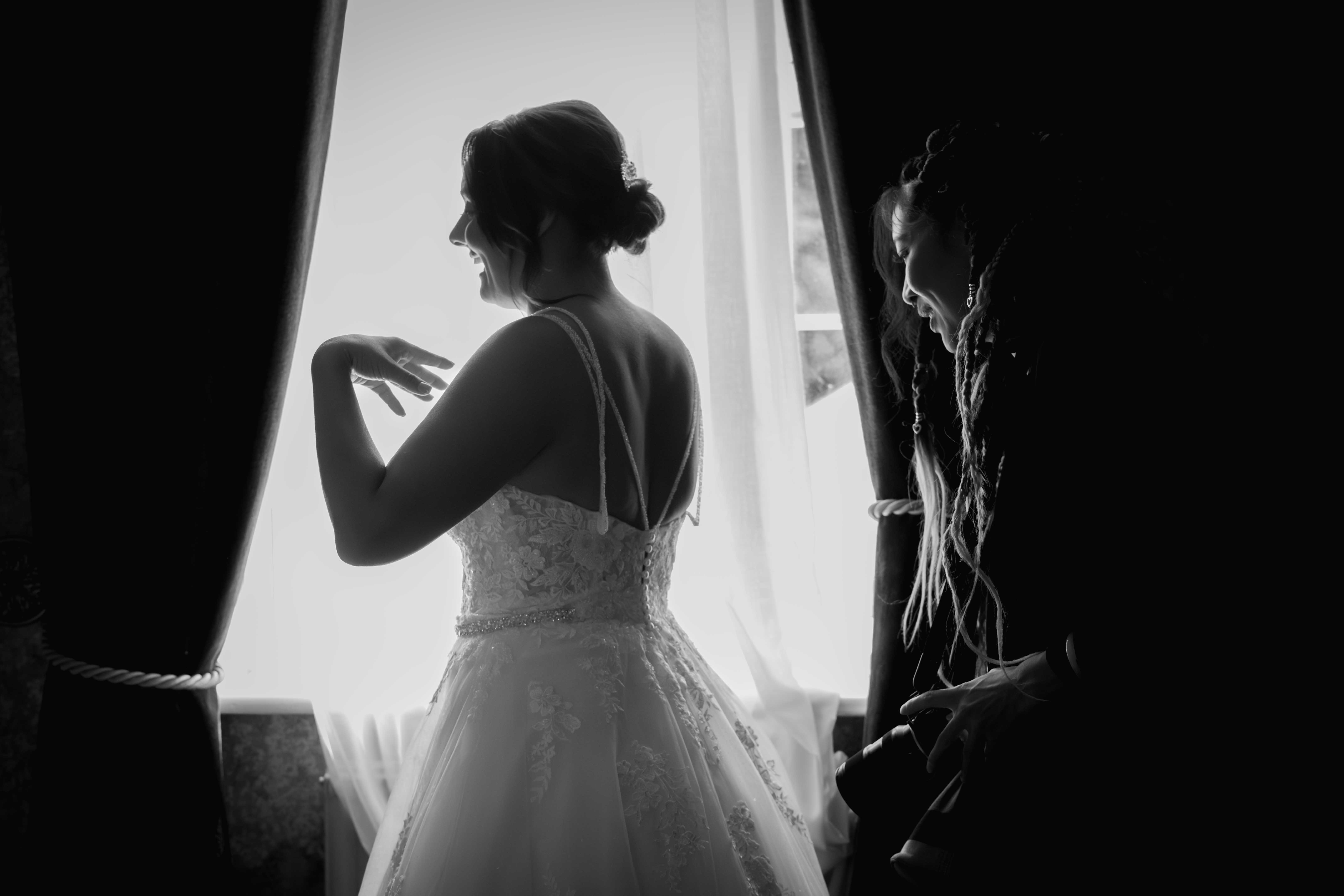 Bridesmaids helping with final touches — Northumberland barn wedding