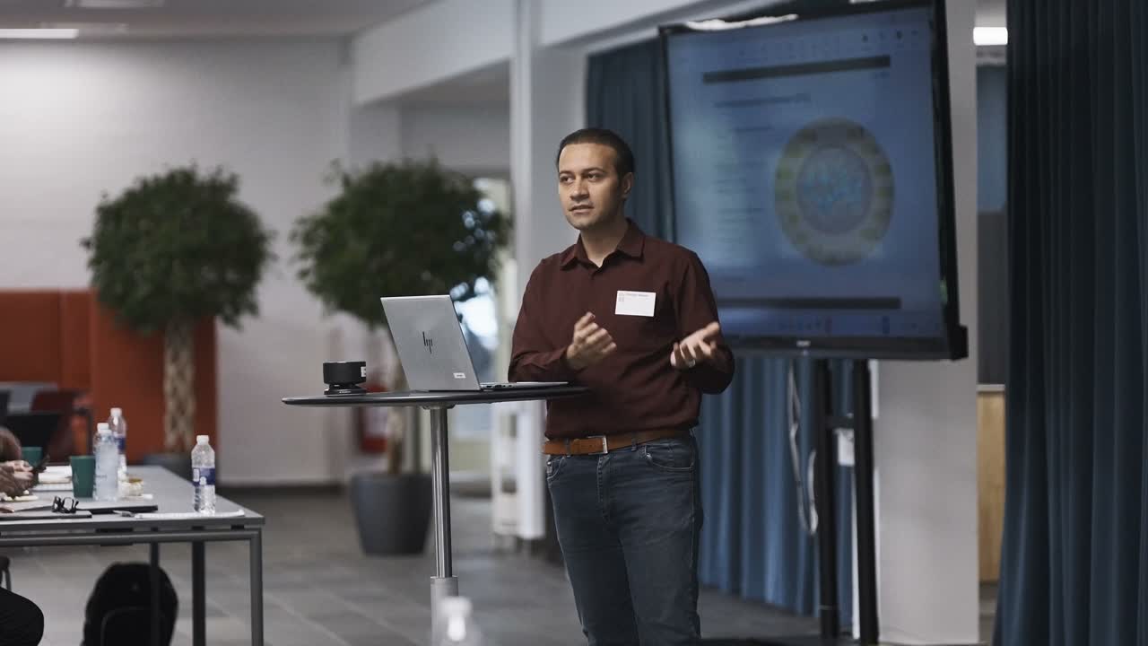 A speaker presenting at the DTU Co4RES meeting, from the finished DS Media highlight film